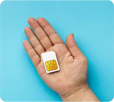 top-view-hand-holding-sim-card